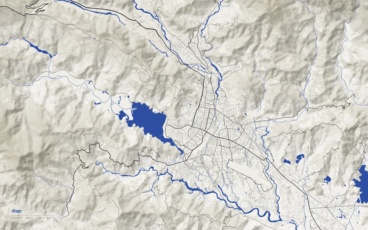 Pokhara Metro in the Ink and River palette: Phewa Lake and the deep gorge of the Seti Gandaki below the Annapurna range.